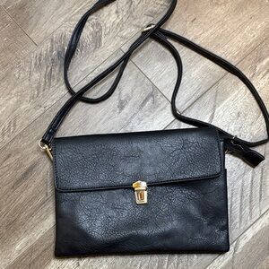 Chic Black Crossbody Bag with Gold Accent